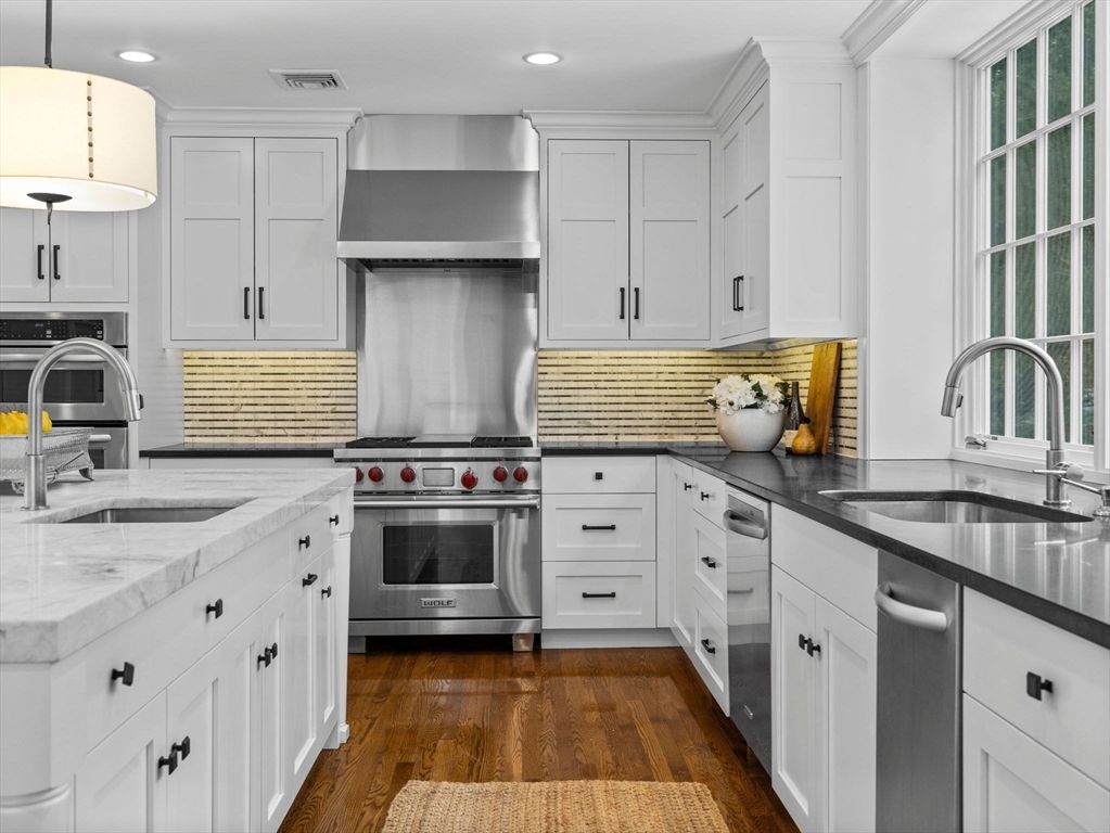 10 Livingston Road Wellesley, MA 02482 - Photo 11 of 36 a kitchen with granite countertop a sink stainless steel appliances and cabinets