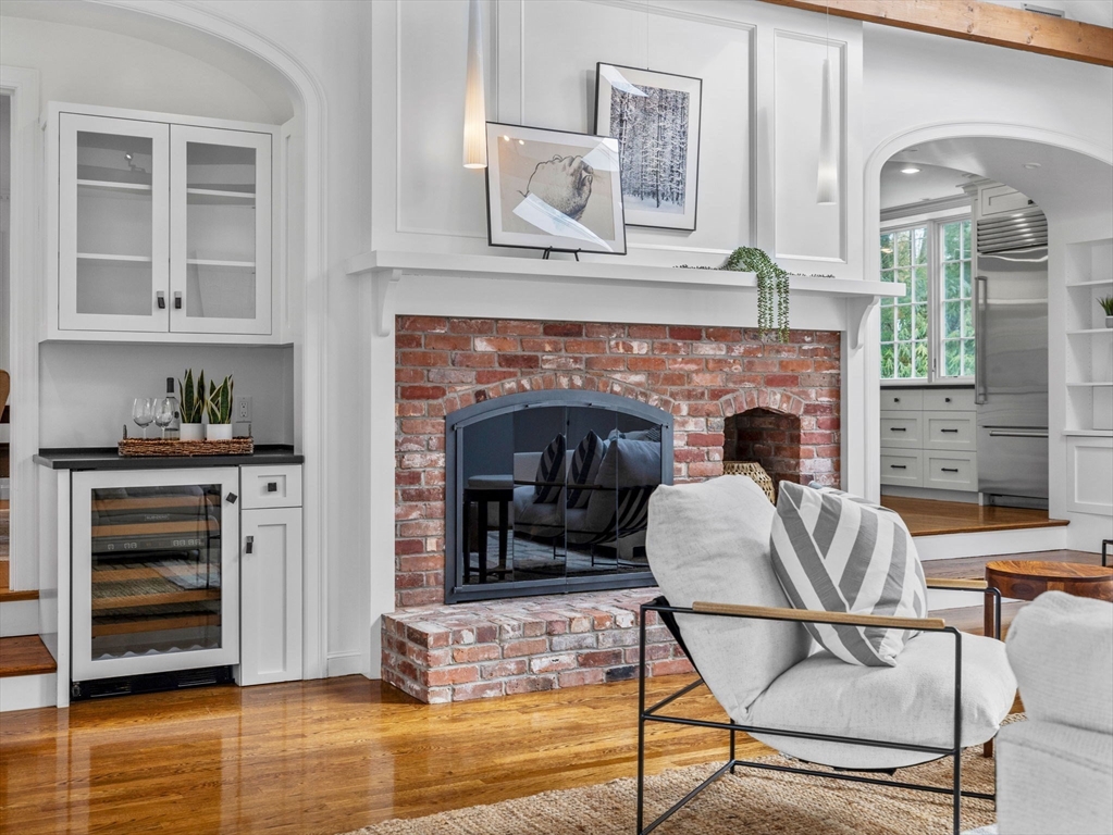 10 Livingston Road Wellesley, MA 02482 - Photo 14 of 36 a living room with furniture and a fireplace