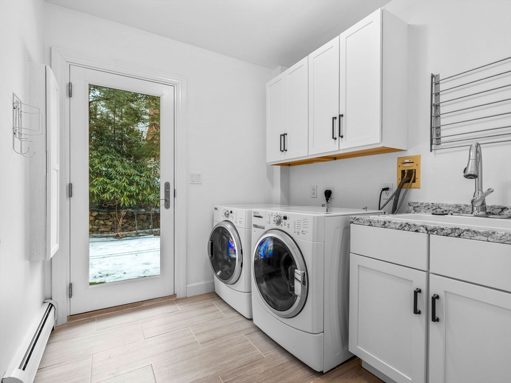 10 Livingston Road Wellesley, MA 02482 - Photo 17 of 36 a utility room with dryer and washer