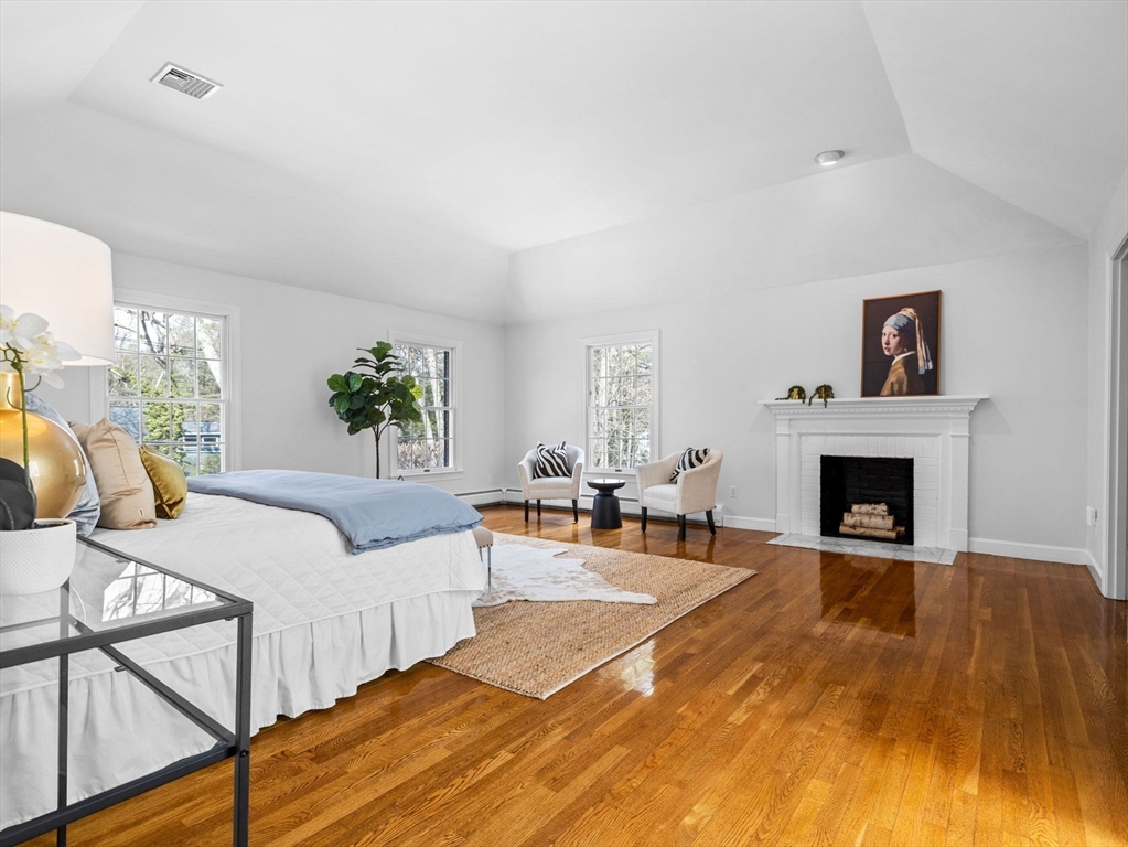 10 Livingston Road Wellesley, MA 02482 - Photo 19 of 36 a living room with furniture and a fireplace
