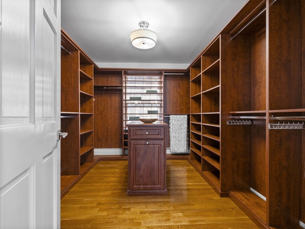10 Livingston Road Wellesley, MA 02482 - Photo 22 of 36 a view of walk in closet with empty racks