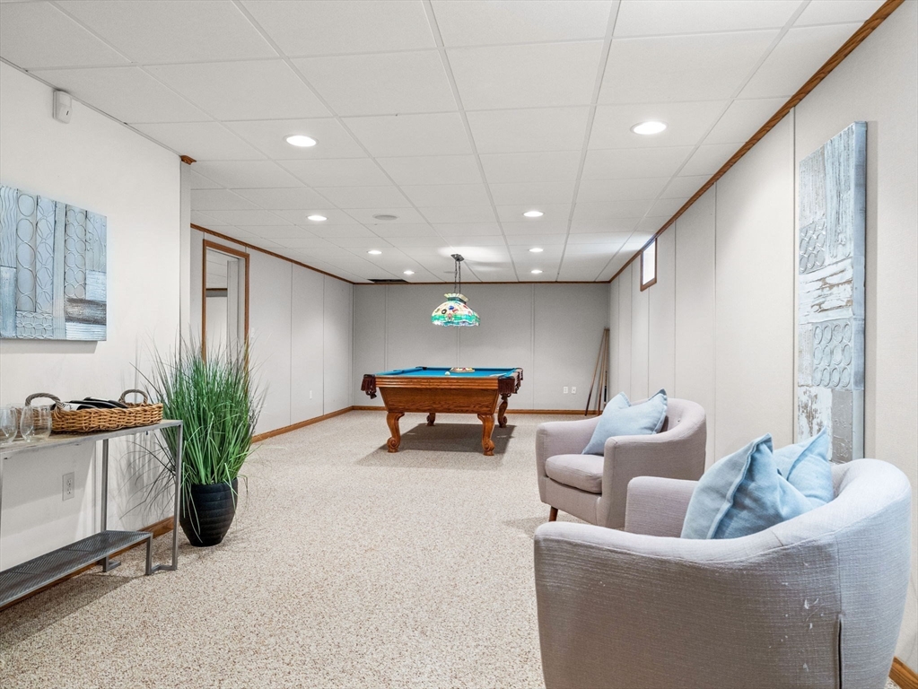 10 Livingston Road Wellesley, MA 02482 - Photo 30 of 36 a lobby with furniture and potted plant