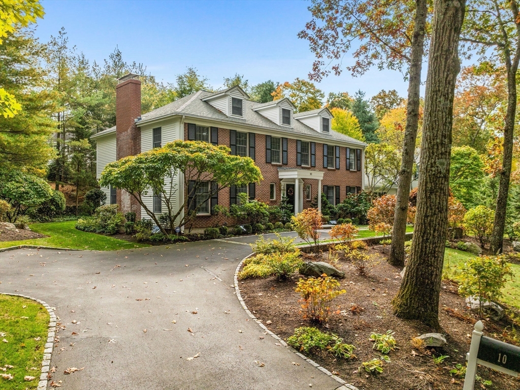 10 Livingston Road Wellesley, MA 02482 - Photo 34 of 36 a front view of a house with garden