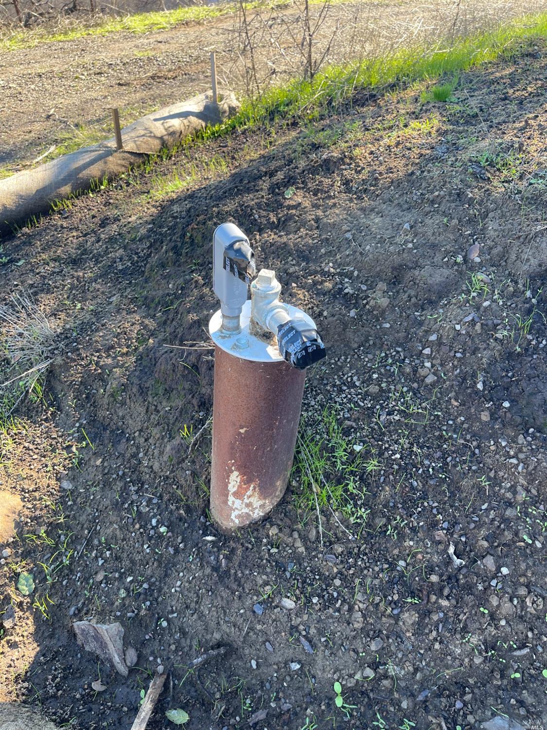 2000 Los Alamos Road Santa Rosa, CA 95409 - Photo 14 of 25 a view of a backyard that has plants and water view