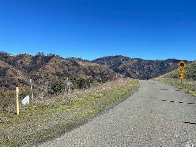 2000 Los Alamos Road Santa Rosa, CA 95409 - Photo 4 of 25 a view of a dry yard with a large tree