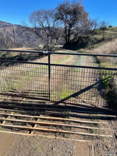 2000 Los Alamos Road Santa Rosa, CA 95409 - Photo 9 of 25 a view of a backyard with a wooden fence