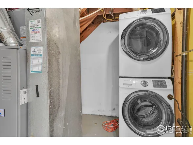 a view of washer and dryer in a utility room