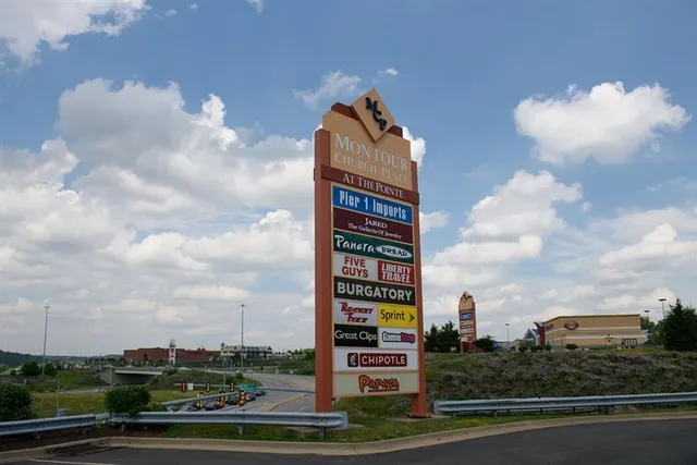 a sign on the side of a street