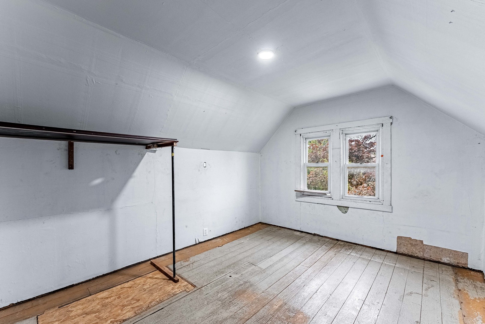 1330 Ridgeland Avenue Berwyn, IL 60402 - Photo 15 of 23 an empty room with wooden floor and windows