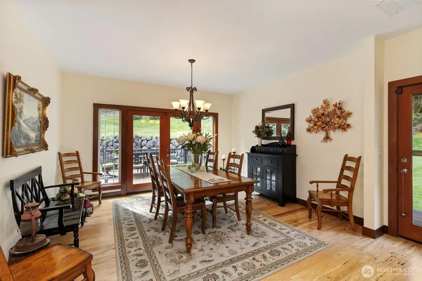 a view of house with a chairs in patio