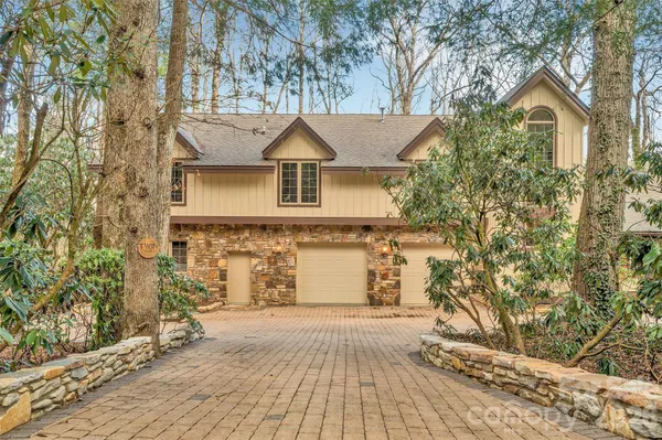 a view of a backyard of the house