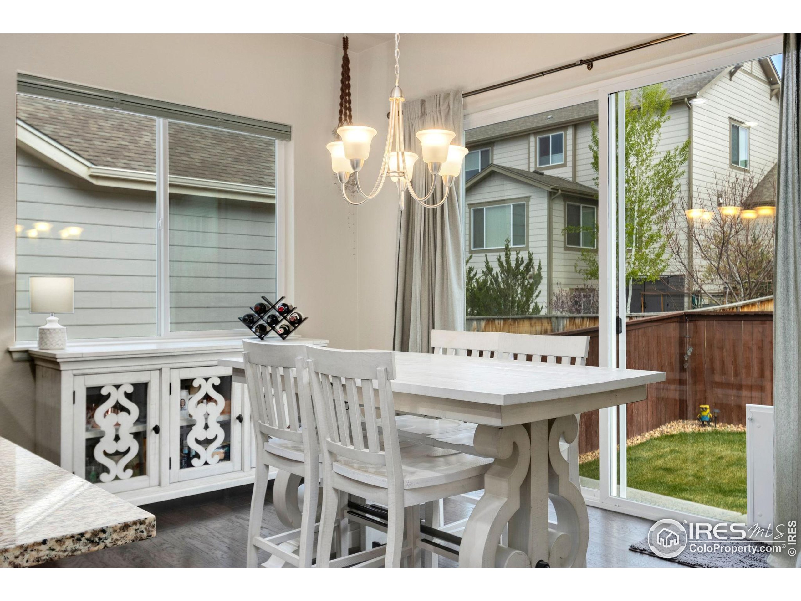 719 Wagon Bend Road Berthoud, CO 80513 - Photo 15 of 40 a view of a chairs and table in a patio