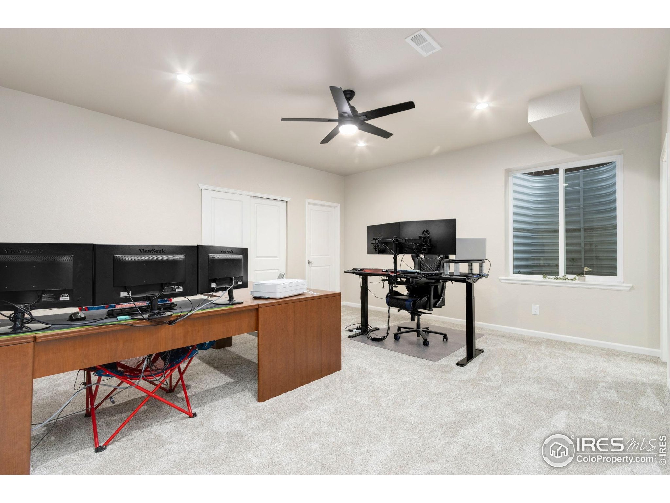 719 Wagon Bend Road Berthoud, CO 80513 - Photo 33 of 40 a workspace with furniture and a window