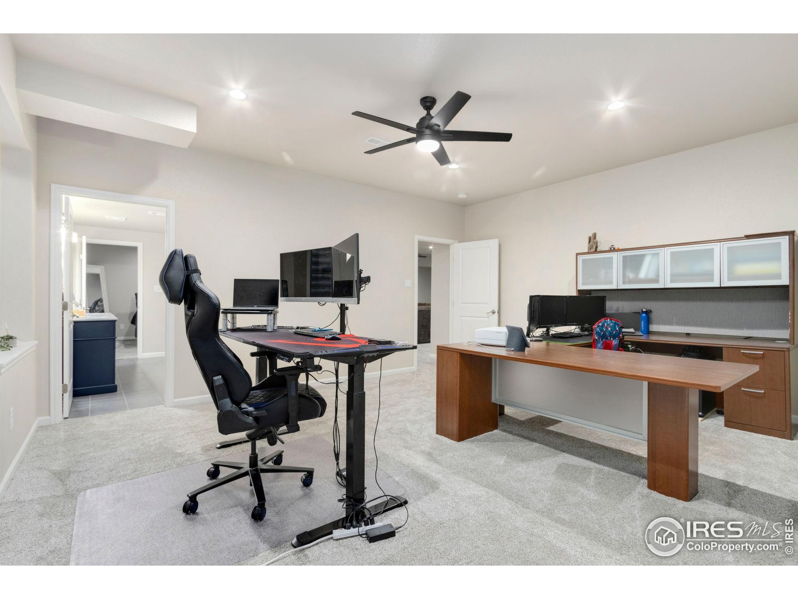 719 Wagon Bend Road Berthoud, CO 80513 - Photo 35 of 40 a view of a workspace with furniture