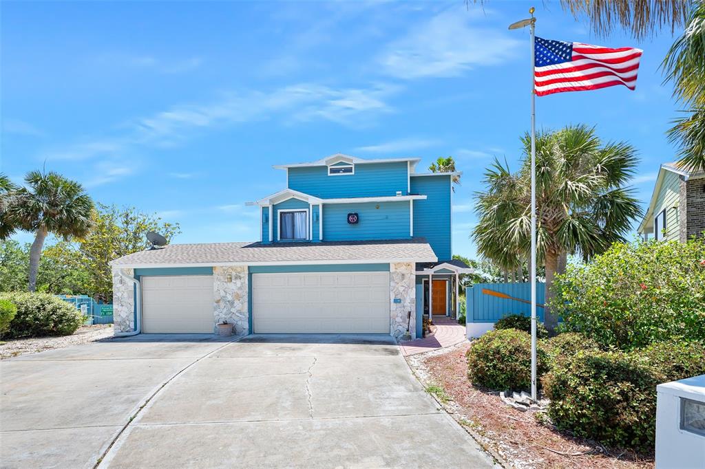 a front view of a house with a garage