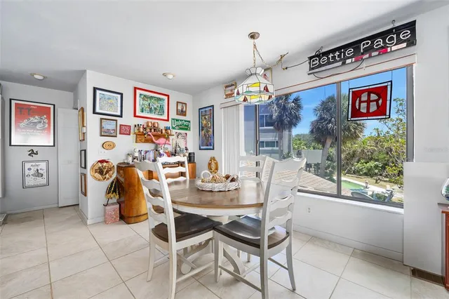 a kitchen with granite countertop a stove top oven sink and cabinets