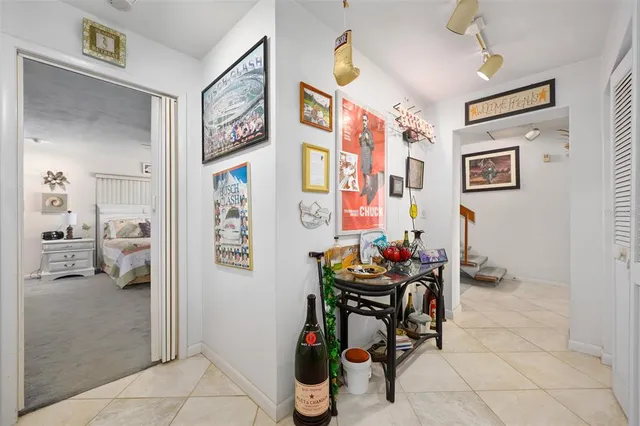 a bathroom with a toilet a sink and a shower curtain
