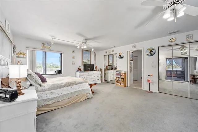 a bed room with a bed and furniture