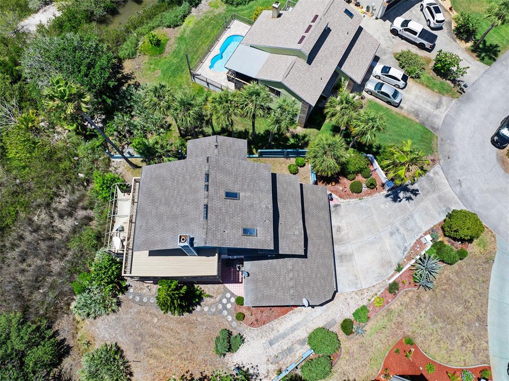 14 Marsh Court Ponce Inlet, FL 32127 - Photo 36 of 64 an aerial view of a house with a yard and black garden