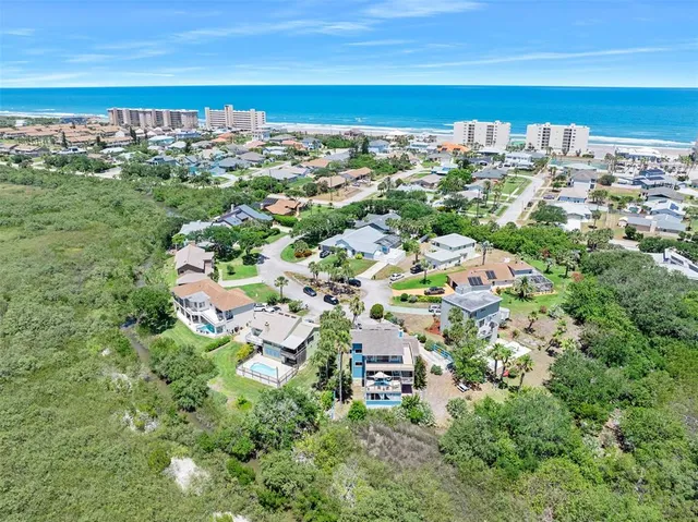 a kitchen with stainless steel appliances granite countertop a stove a refrigerator and a microwave