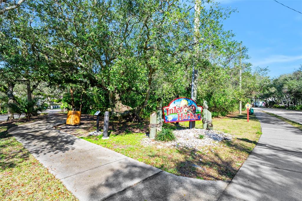 14 Marsh Court Ponce Inlet, FL 32127 - Photo 65 of 68 a childrens park with lots of swings and slides