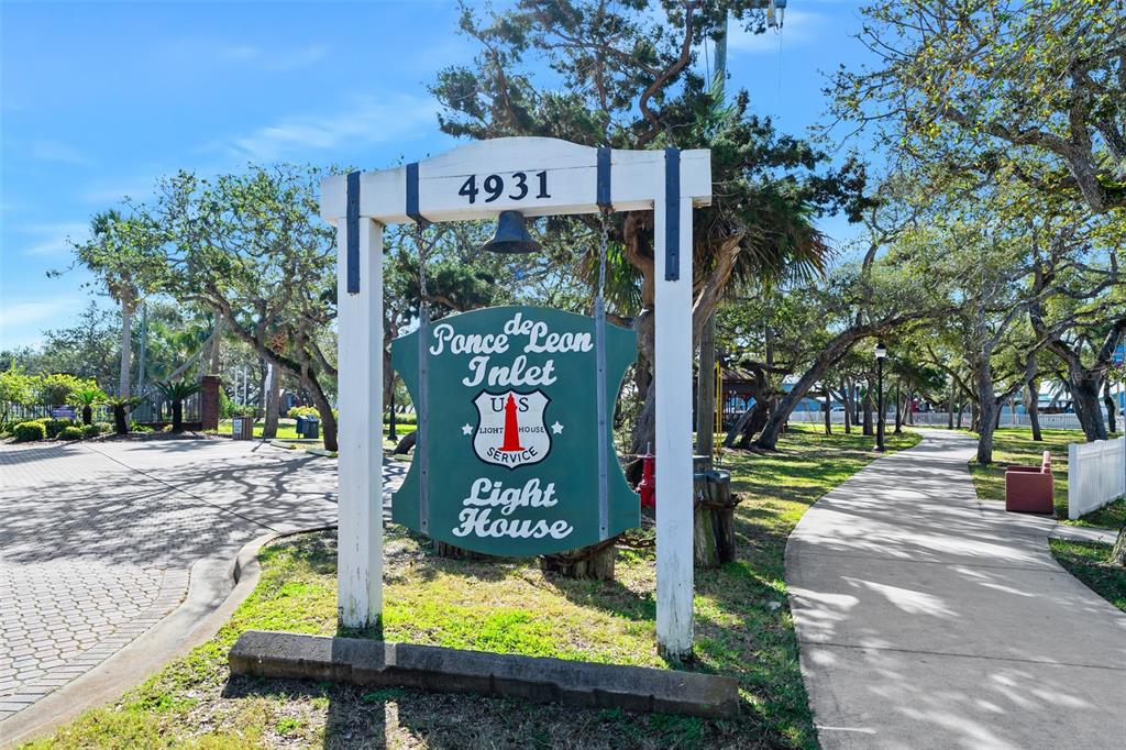 14 Marsh Court Ponce Inlet, FL 32127 - Photo 66 of 68 a sign that is on the side of the road