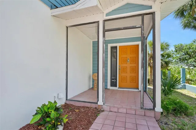 a kitchen with stainless steel appliances kitchen island granite countertop a refrigerator and cabinets