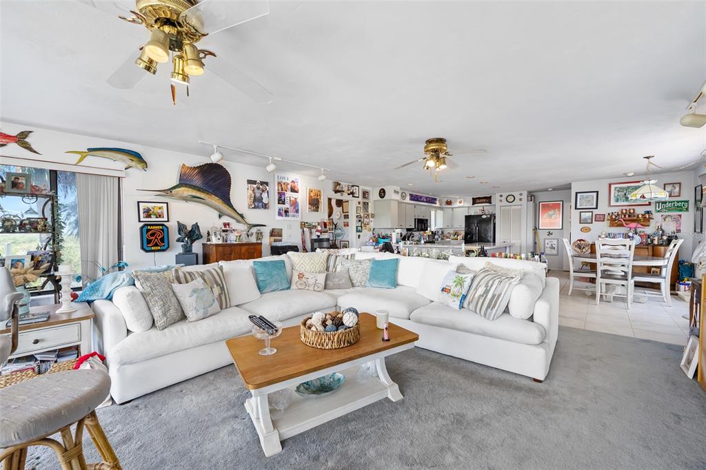 14 Marsh Court Ponce Inlet, FL 32127 - Photo 10 of 64 a living room with furniture and wooden floor