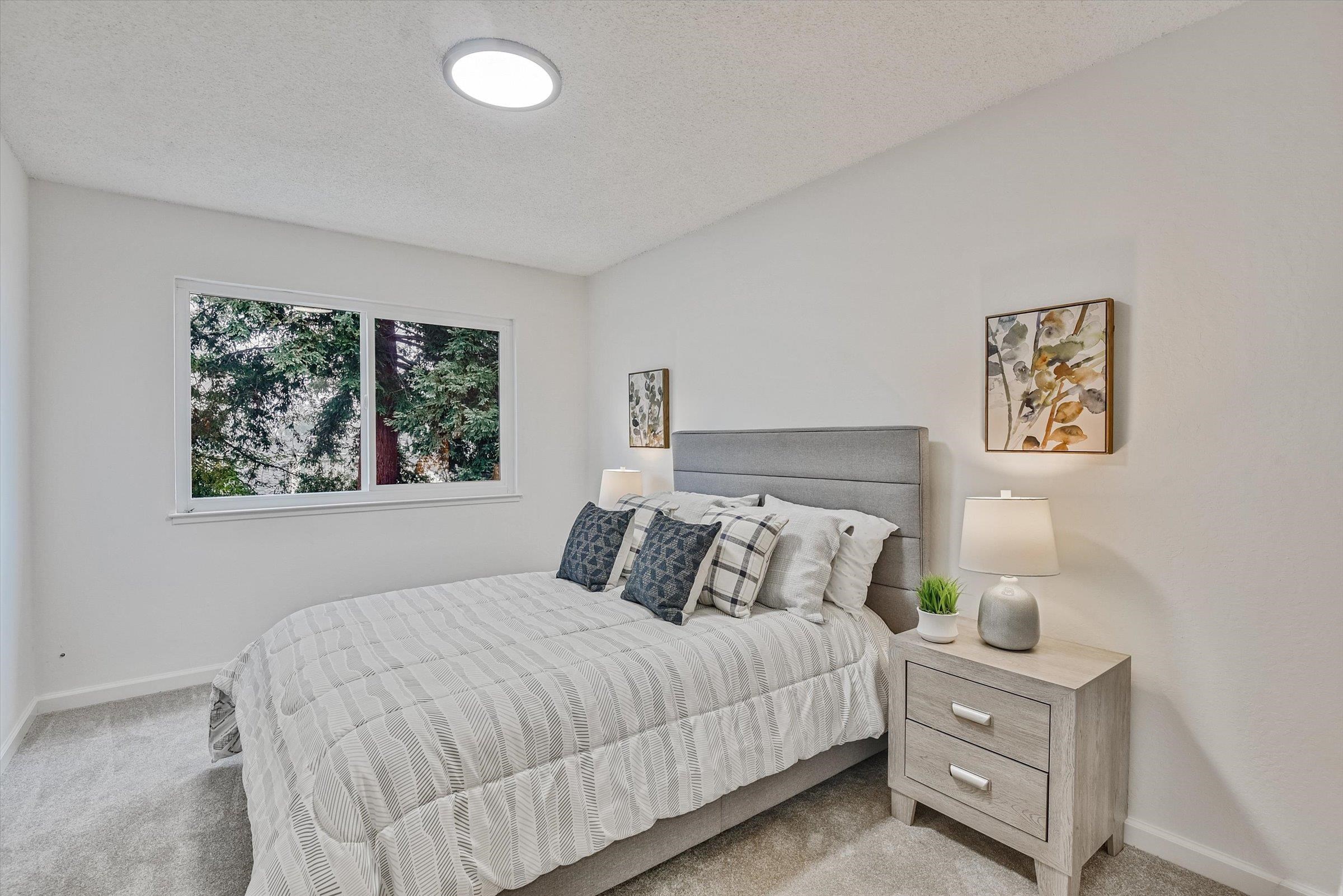 1524 Ridgewood Drive Martinez, CA 94553 - Photo 18 of 33 a bedroom with a bed and a window