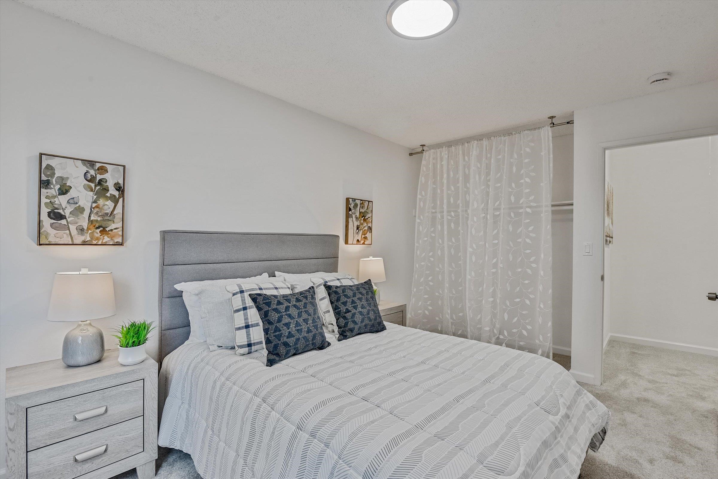 1524 Ridgewood Drive Martinez, CA 94553 - Photo 20 of 33 a bedroom with bed and cupboard