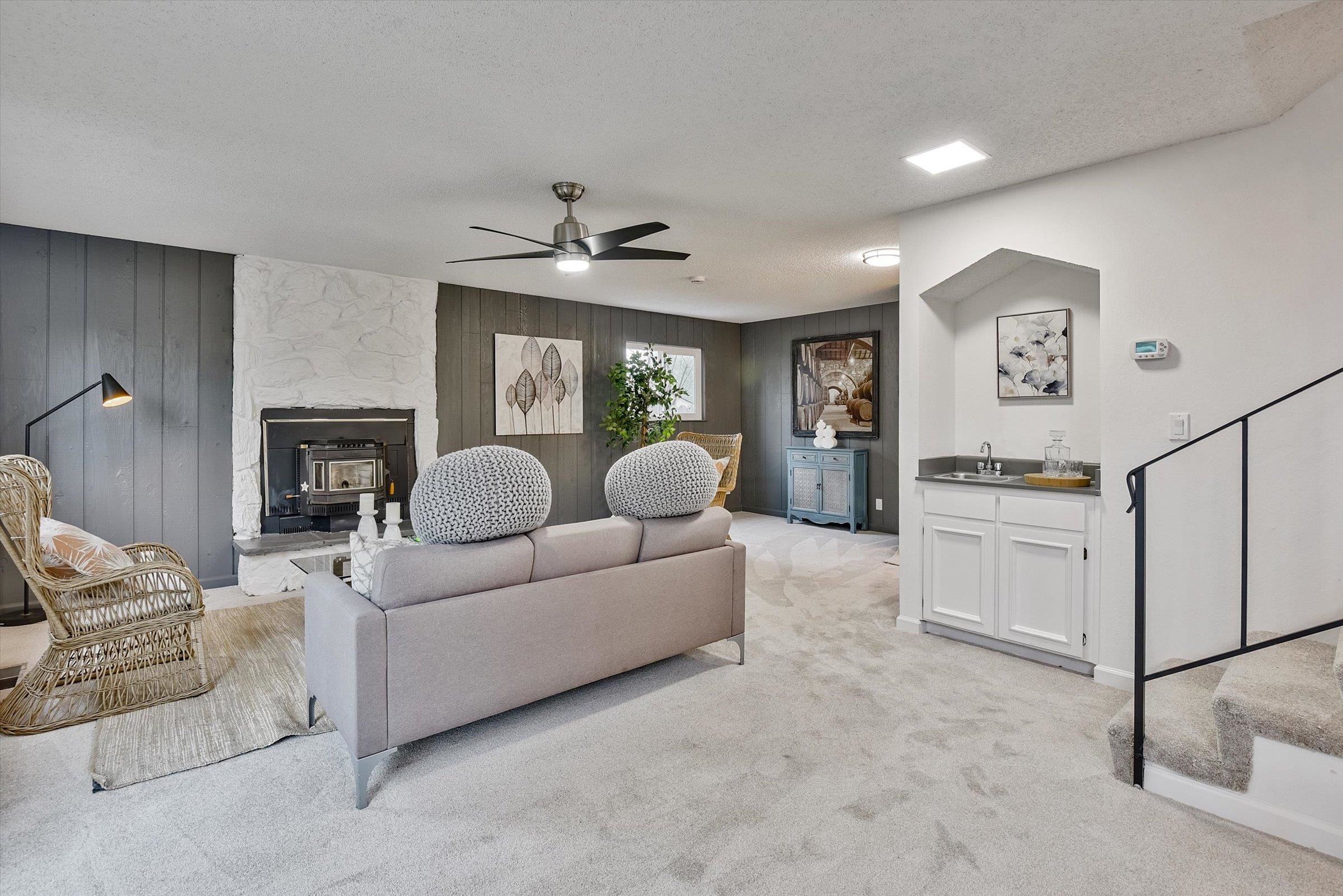 1524 Ridgewood Drive Martinez, CA 94553 - Photo 27 of 33 a living room with furniture and a fireplace