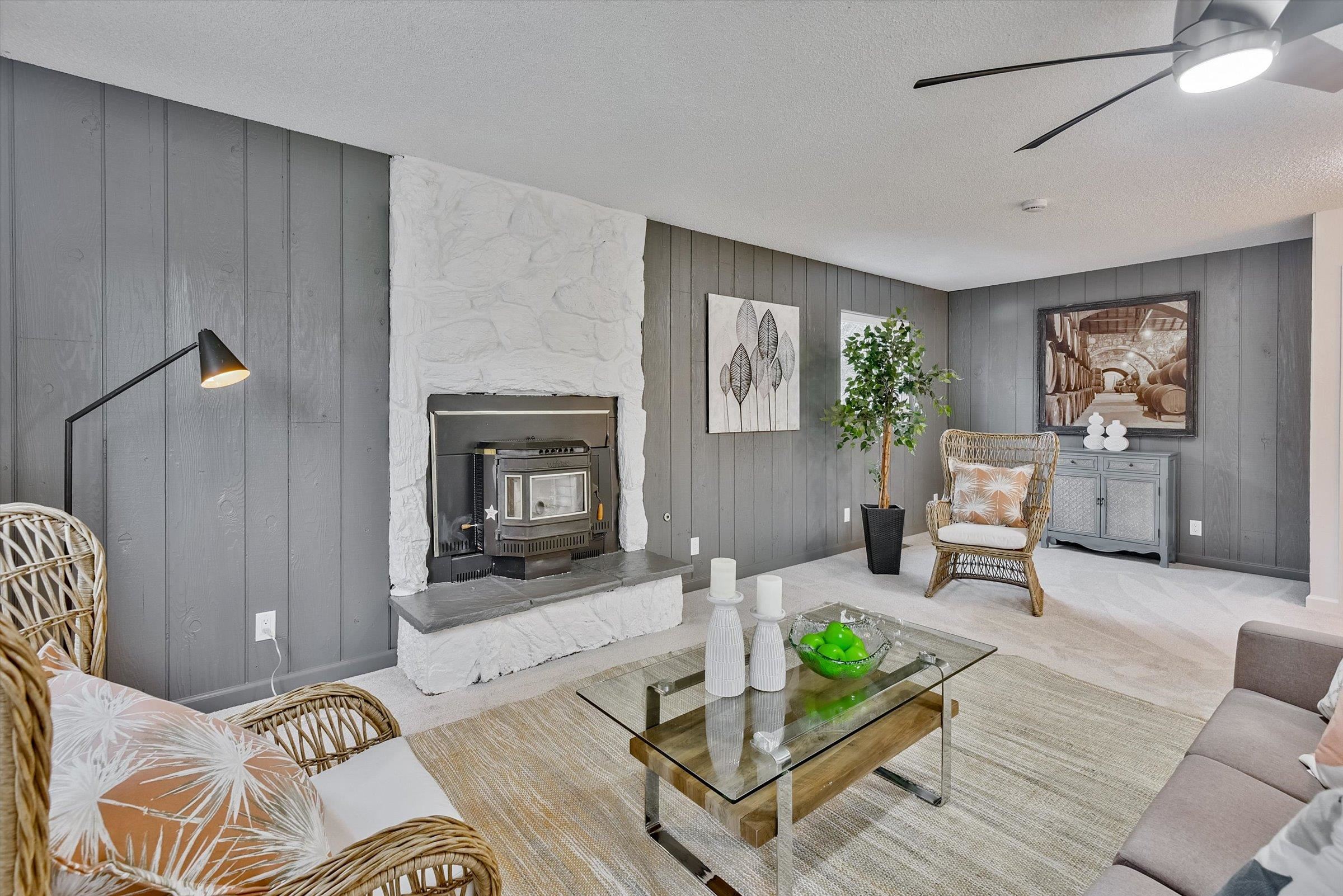 1524 Ridgewood Drive Martinez, CA 94553 - Photo 28 of 33 a living room with furniture and a fireplace