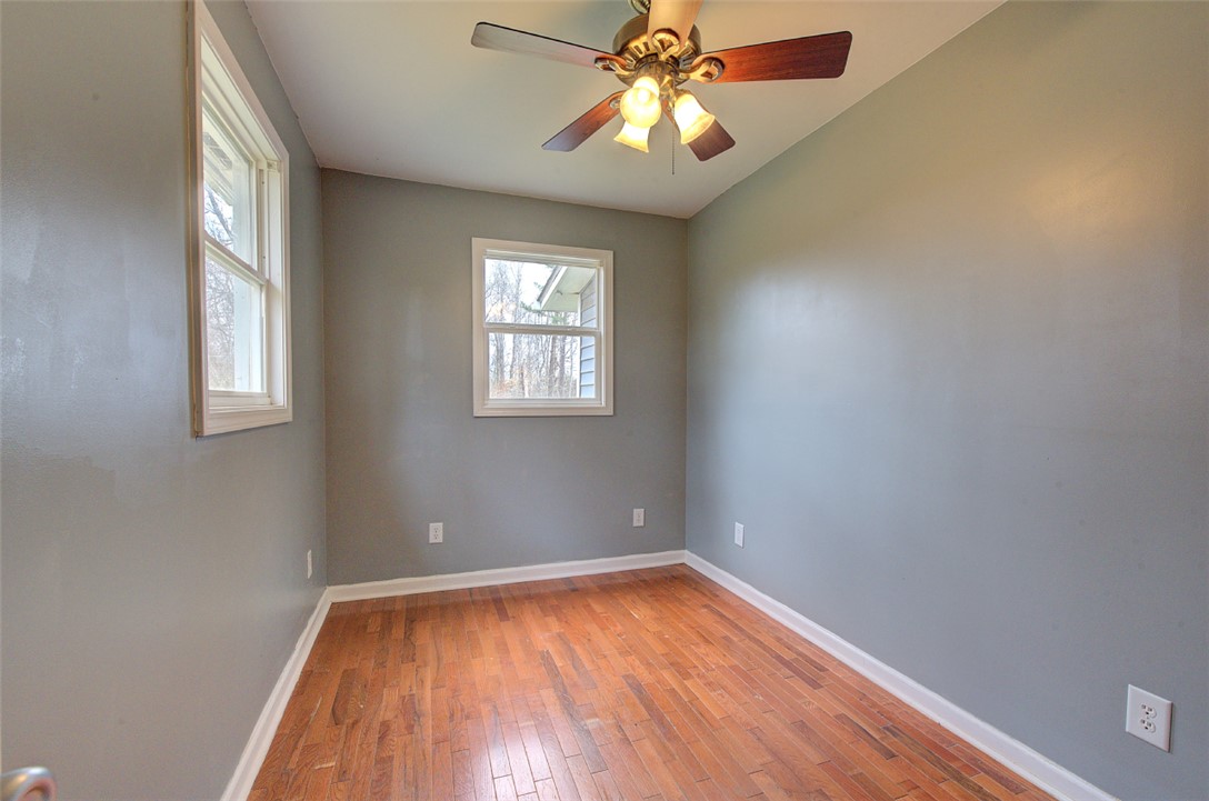 325 Rock Quarry Road Travelers Rest, SC 29690 - Photo 25 of 37 This spacious room features ample natural light and durable flooring, perfect for versatile living.