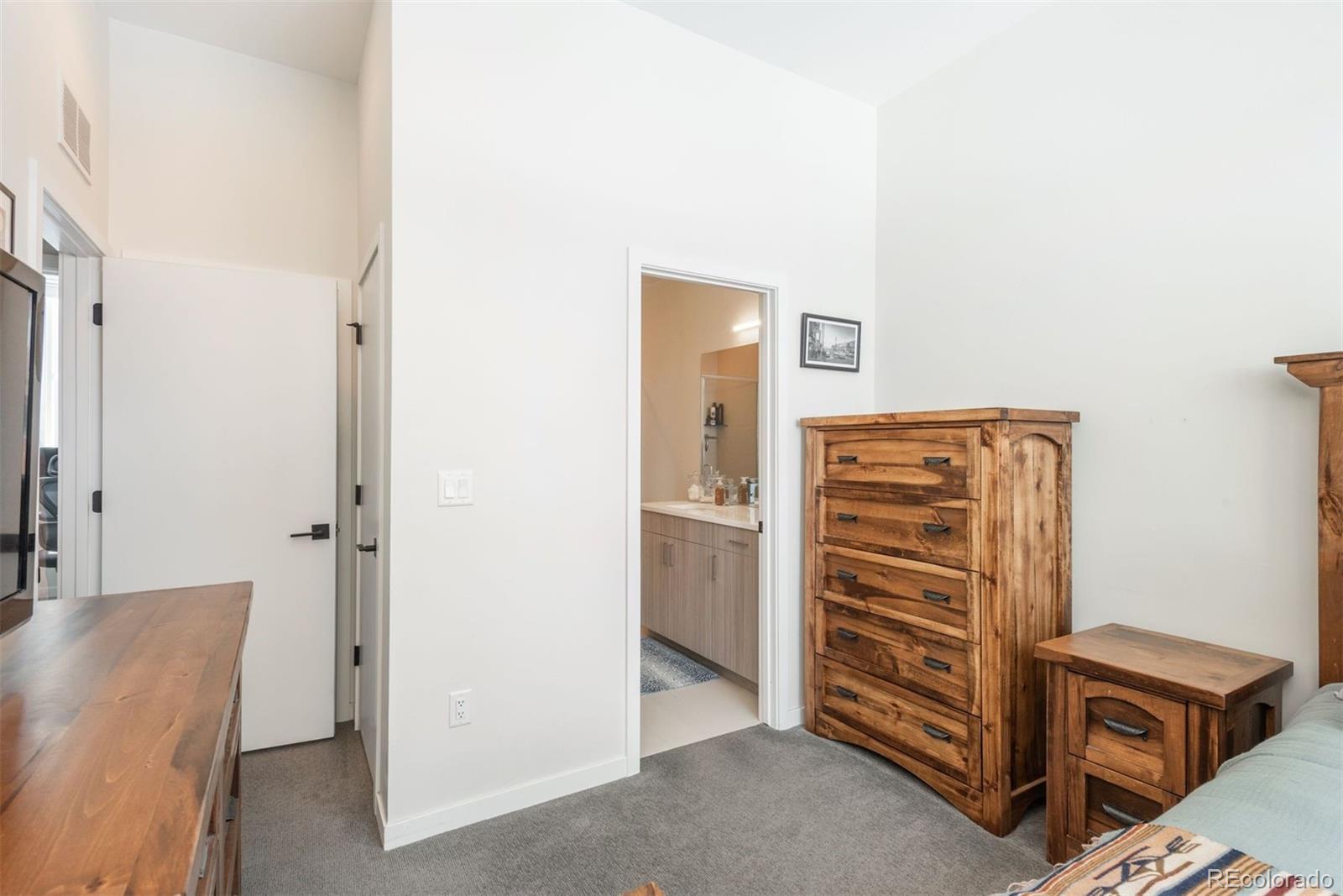 910 West 40th Avenue Denver, CO 80211 - Photo 13 of 33 a view of room with furniture and refrigerator