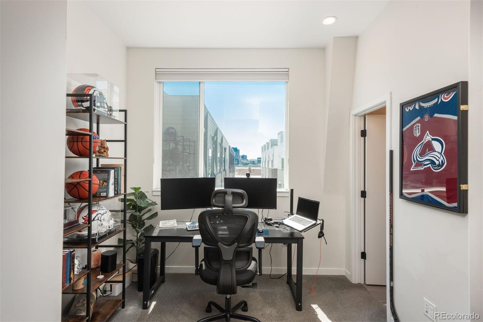 910 West 40th Avenue Denver, CO 80211 - Photo 15 of 33 a view of a workspace with furniture