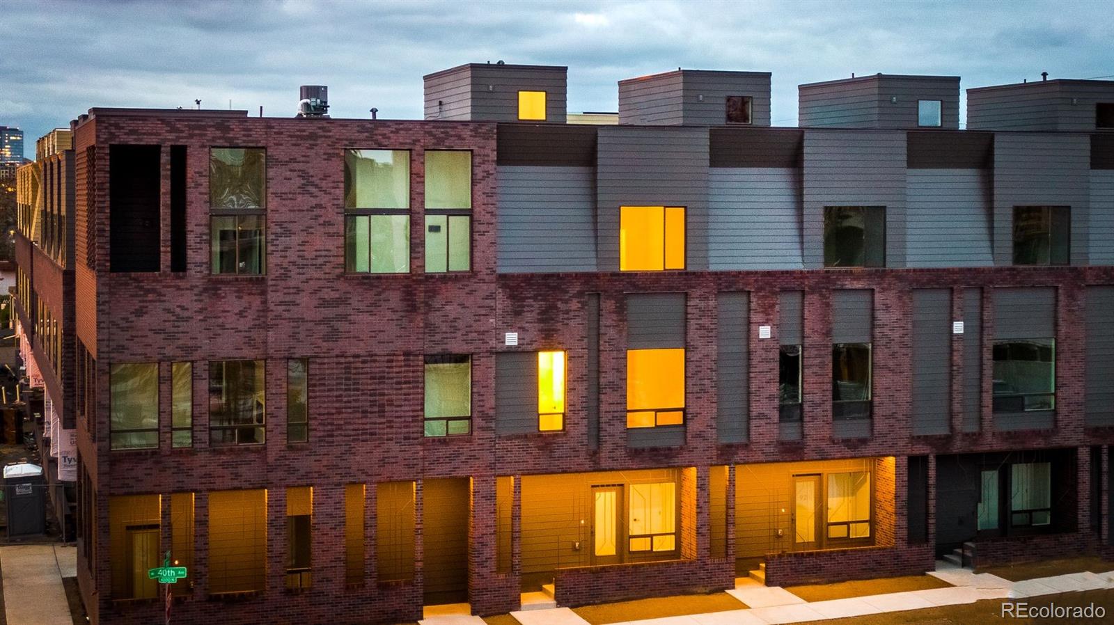 910 West 40th Avenue Denver, CO 80211 - Photo 26 of 33 a view of a brick building with many windows
