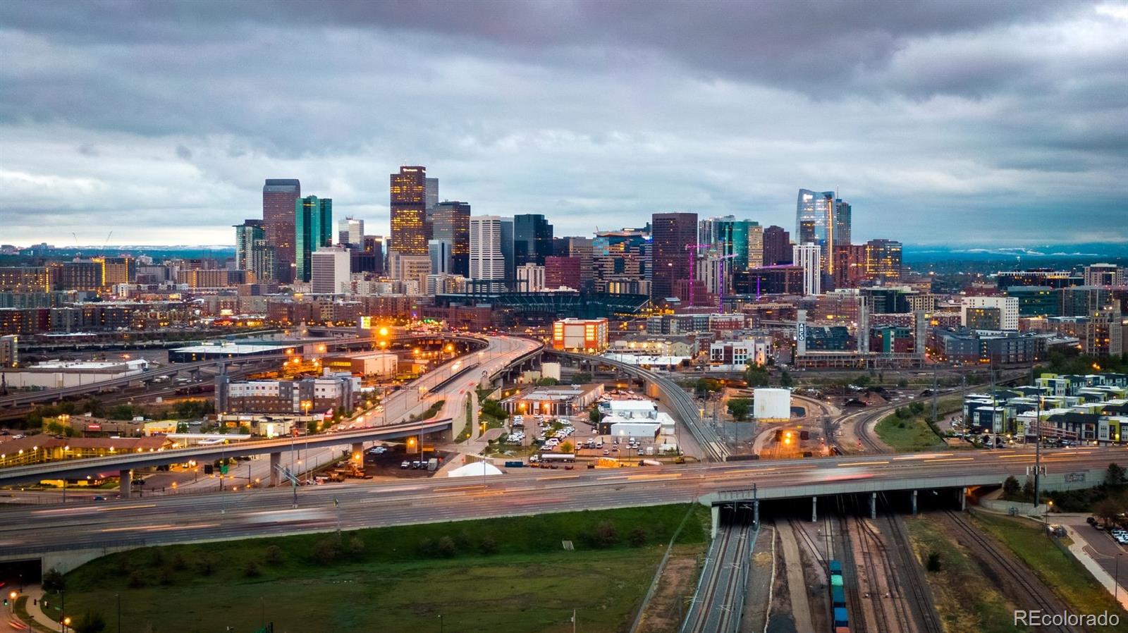 910 West 40th Avenue Denver, CO 80211 - Photo 31 of 33 a city view with tall buildings