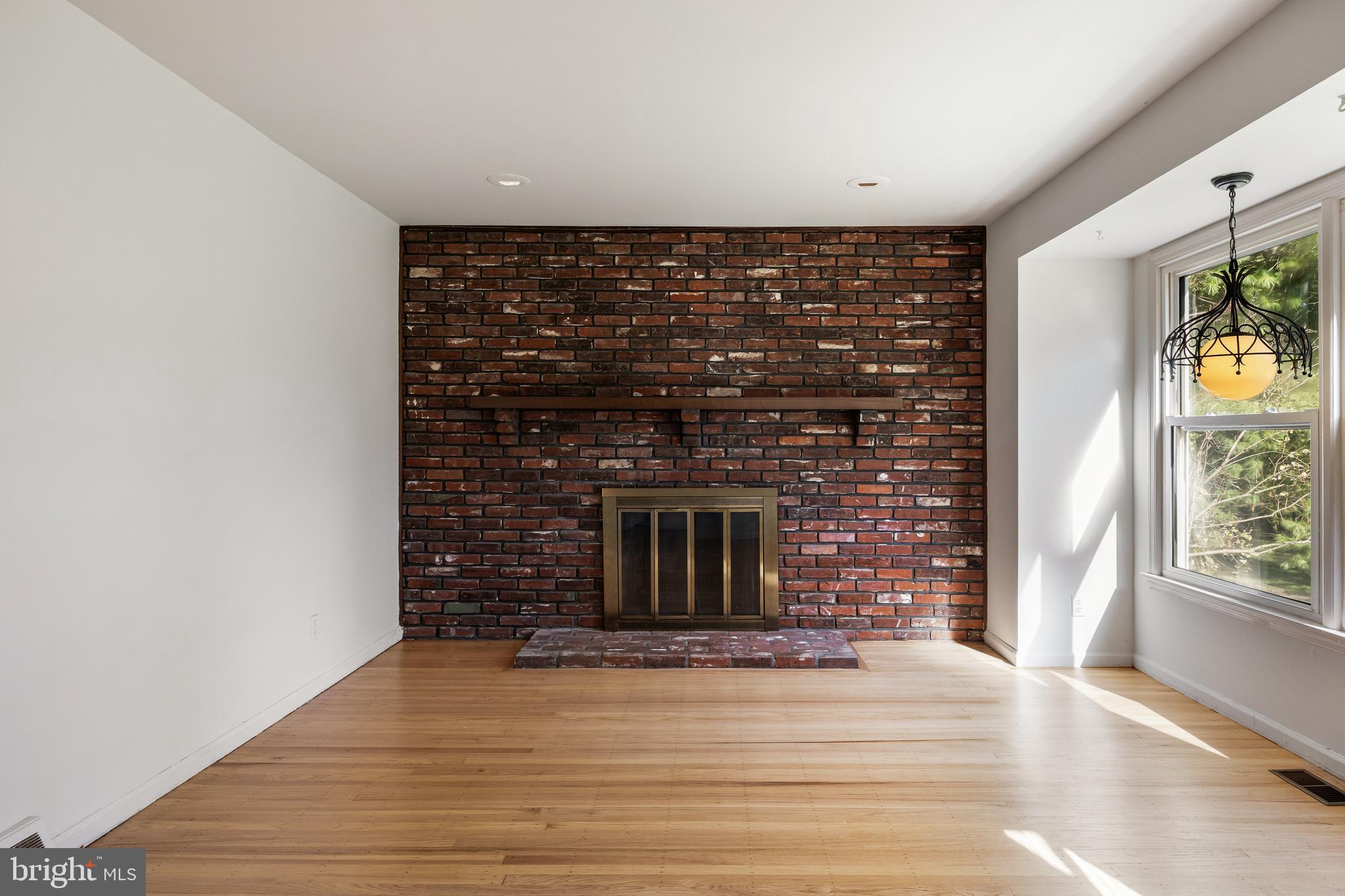 602 Wellfleet Road Cinnaminson, NJ 08077 - Photo 12 of 35 a view of a fireplace in a room