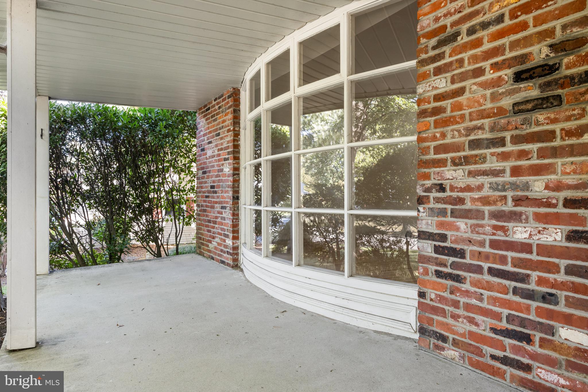602 Wellfleet Road Cinnaminson, NJ 08077 - Photo 5 of 35 a view of a balcony with a plants and a window