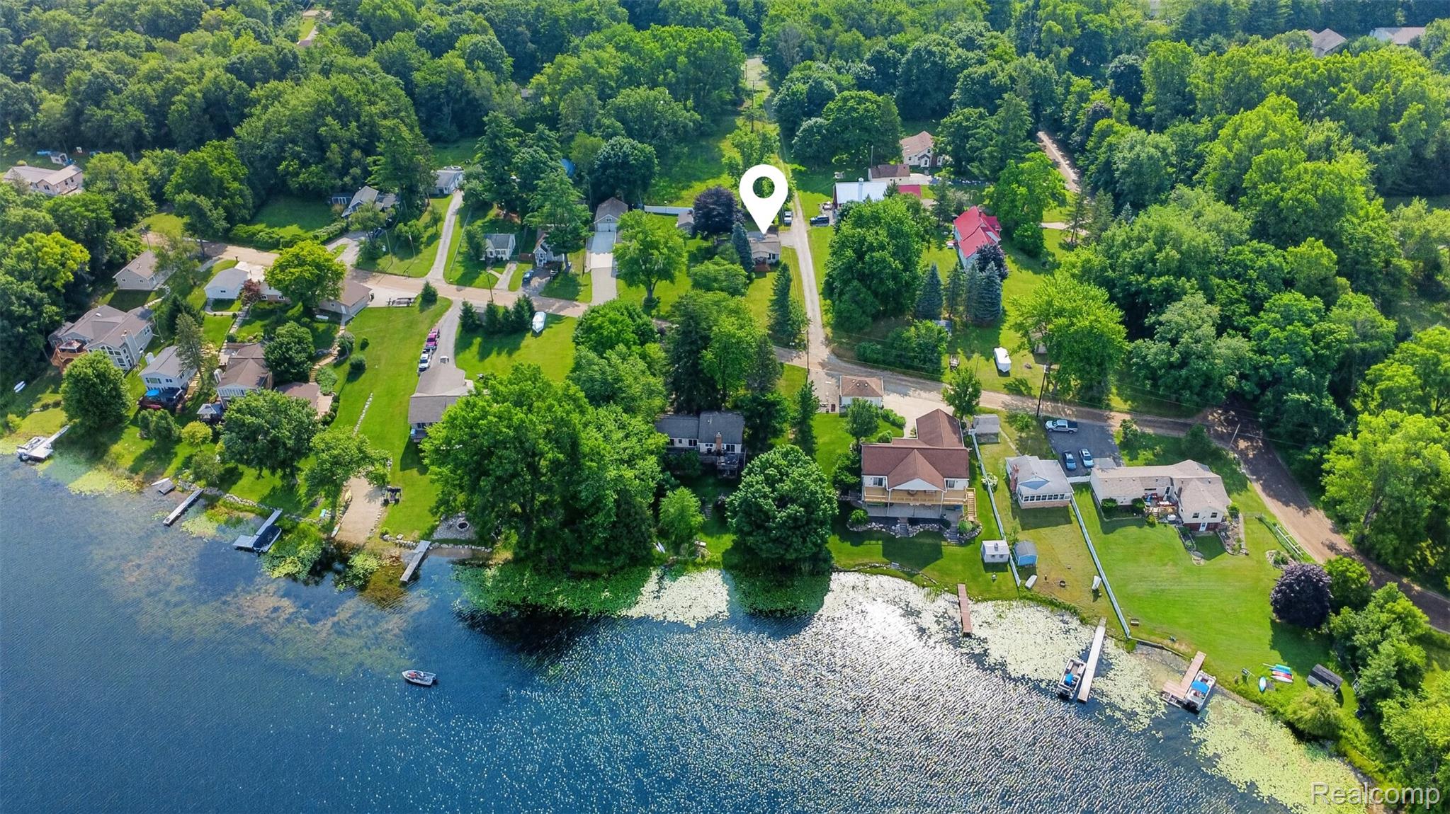 5977 Anglers Road Ortonville, MI 48462 - Photo 36 of 63 Aerial perspective showcasing a waterfront property with a private dock