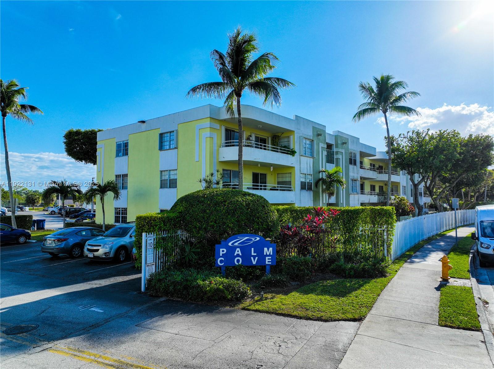 10765 Southwest 108th Avenue, Unit 208 Miami, FL 33176 - Photo 30 of 45 a front view of a house with garden