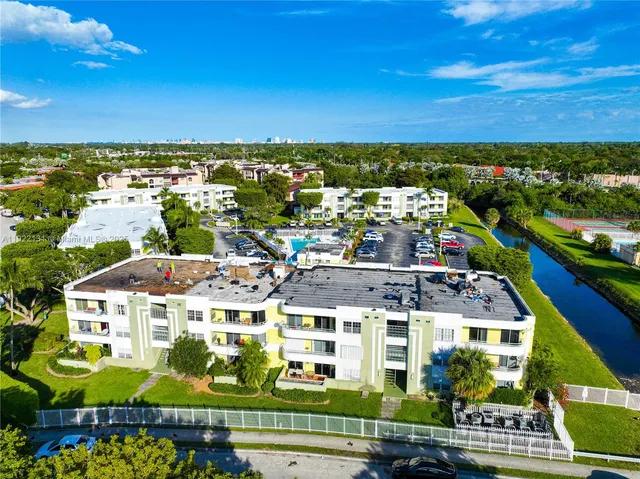 an outdoor space with furniture and garden view