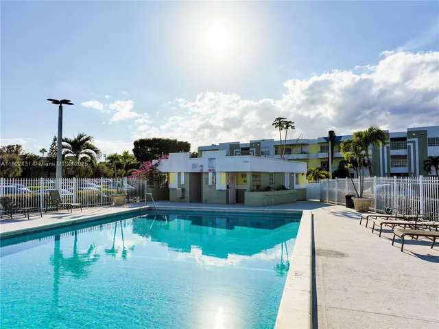 a view of a chairs and tables in the city