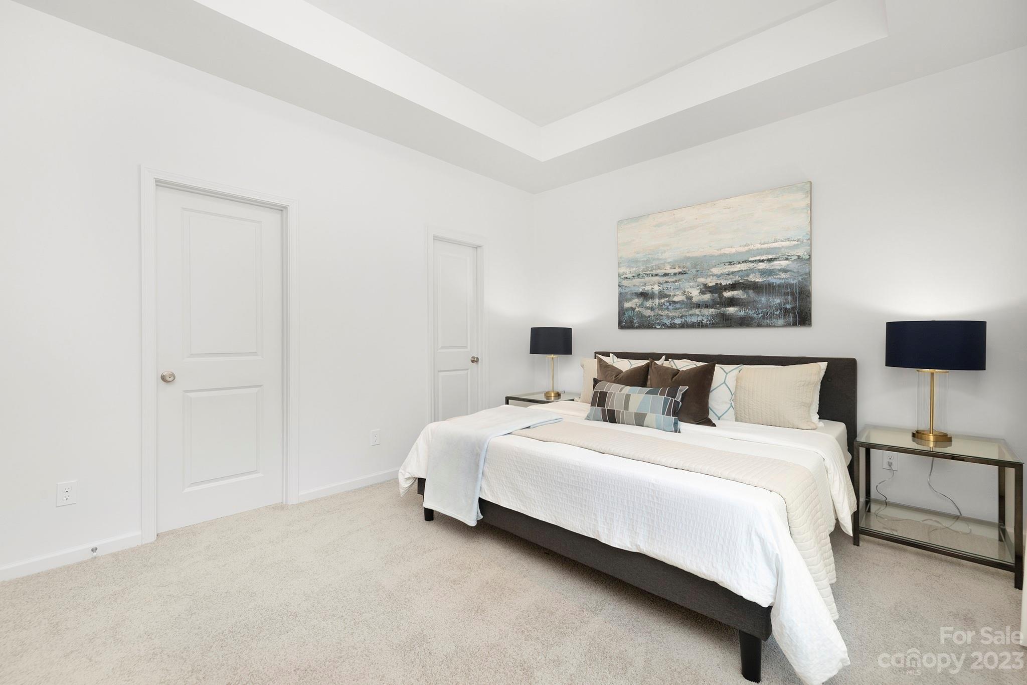 8725 Mt Holly Road Charlotte, NC 28214 - Photo 11 of 19 a bedroom with a bed and a wall painting