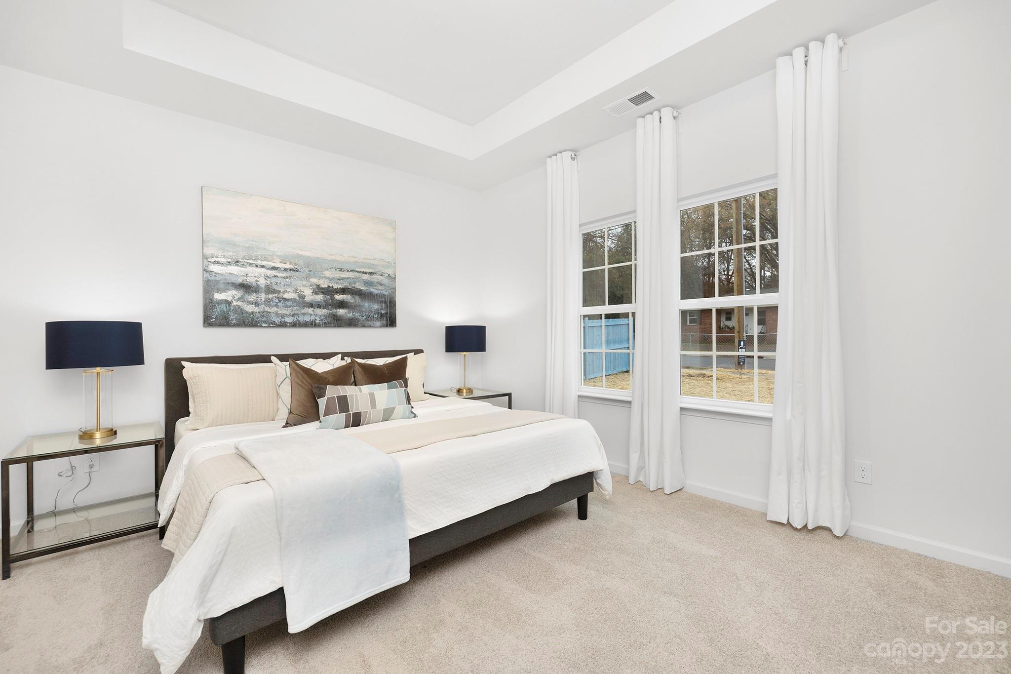 8725 Mt Holly Road Charlotte, NC 28214 - Photo 13 of 19 a bed room with a bed and a window