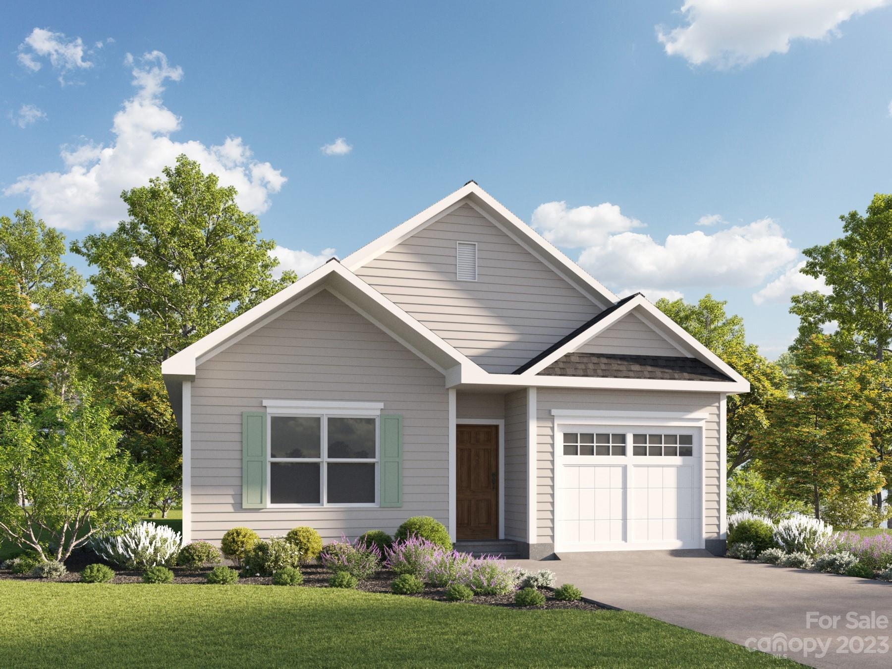8725 Mt Holly Road Charlotte, NC 28214 - Photo 5 of 19 a front view of a house with a yard and garage