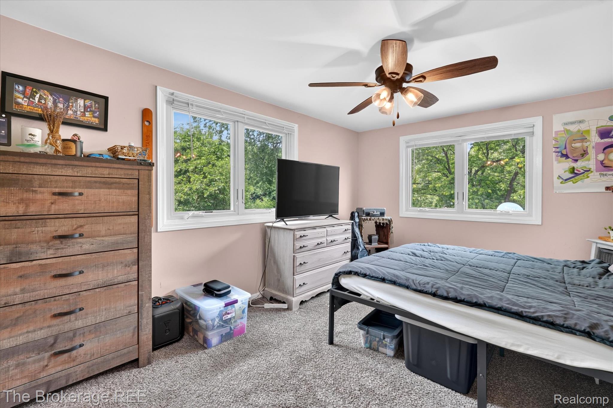 13269 North Genesee Road Clio, MI 48420 - Photo 24 of 67 Bedroom featuring two windows, carpet flooring, a ceiling fan with integrated lighting, and painted walls