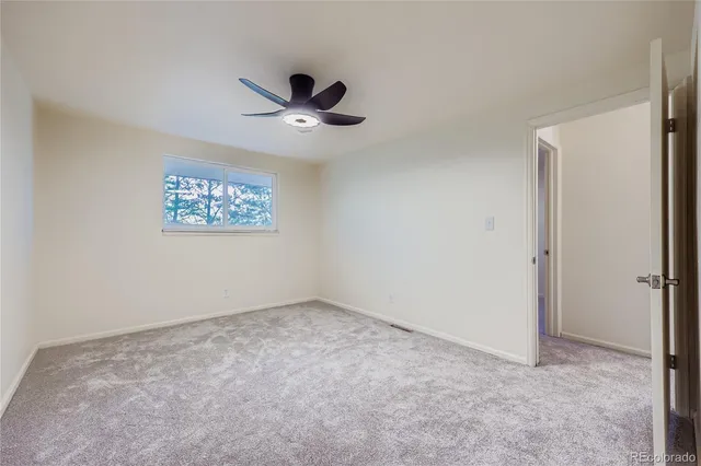 a bathroom with a sink a toilet a shower and a mirror