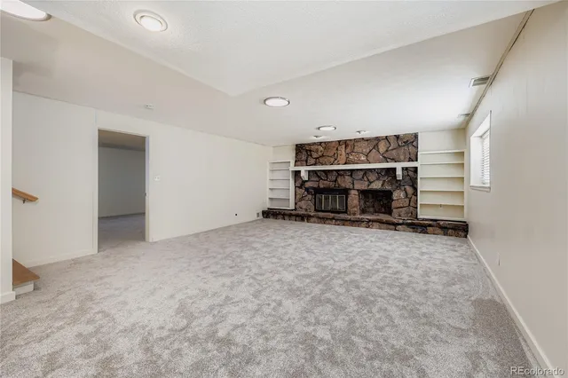a view of a porch with furniture and yard