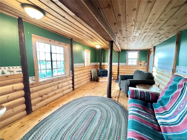 a room with furniture and a chandelier